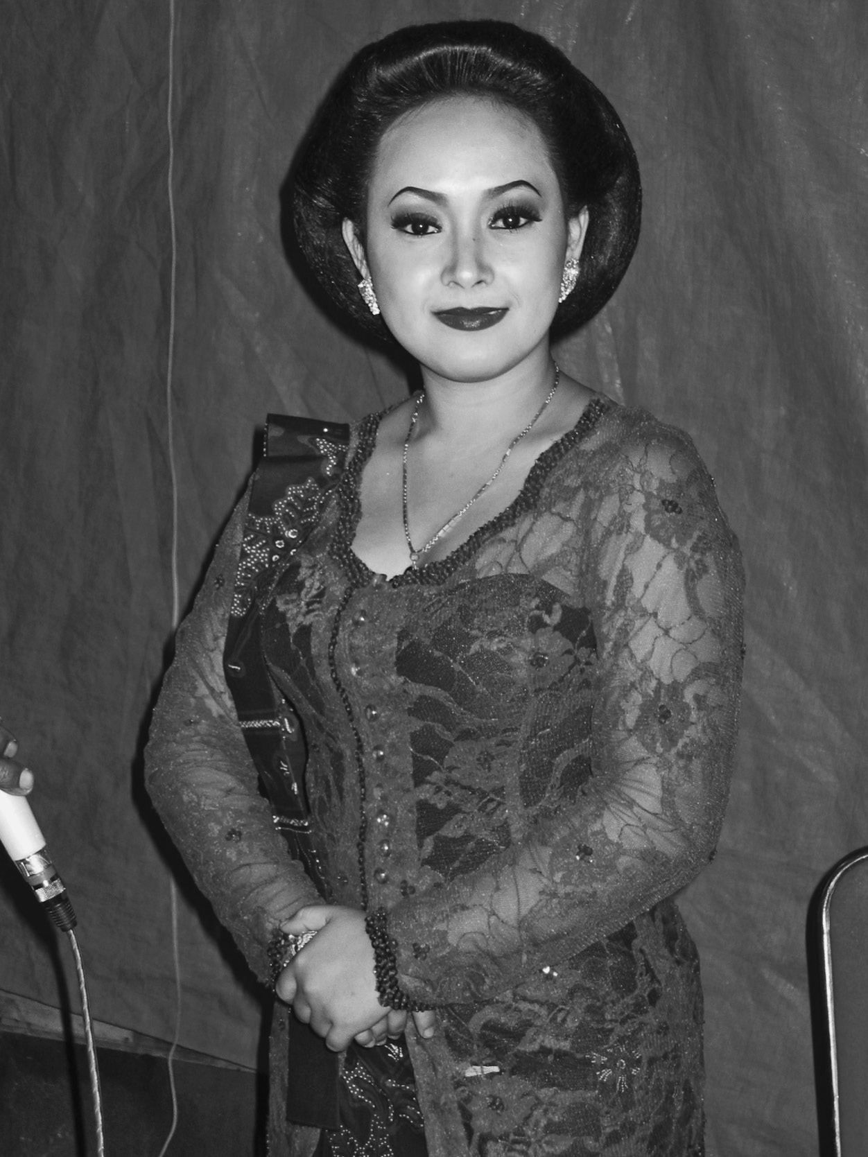 Sri Handayani, performing as a singer-dancer for a tayub event, wears feminine attire. Photograph taken by the author, 2006.